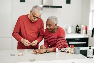 A senior couple trying to understand their medication