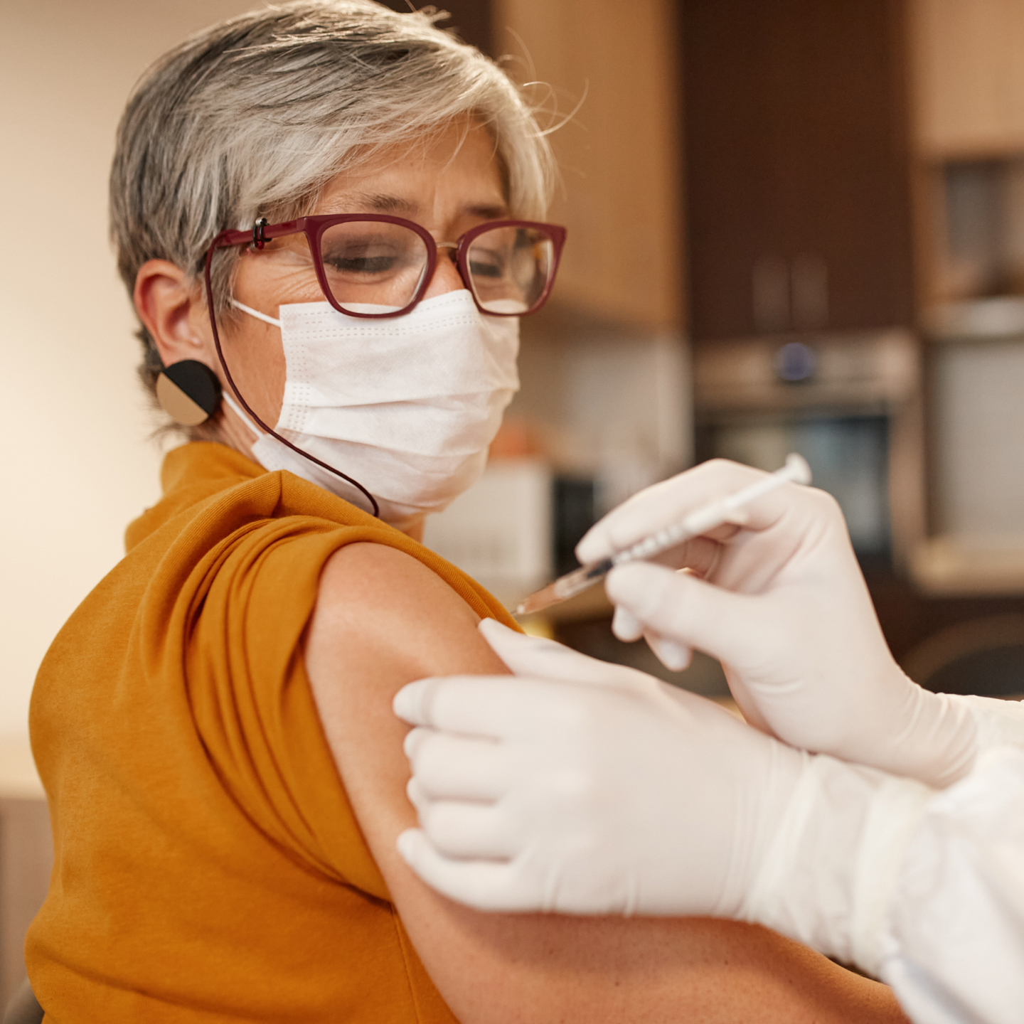 A woman getting vaccinated