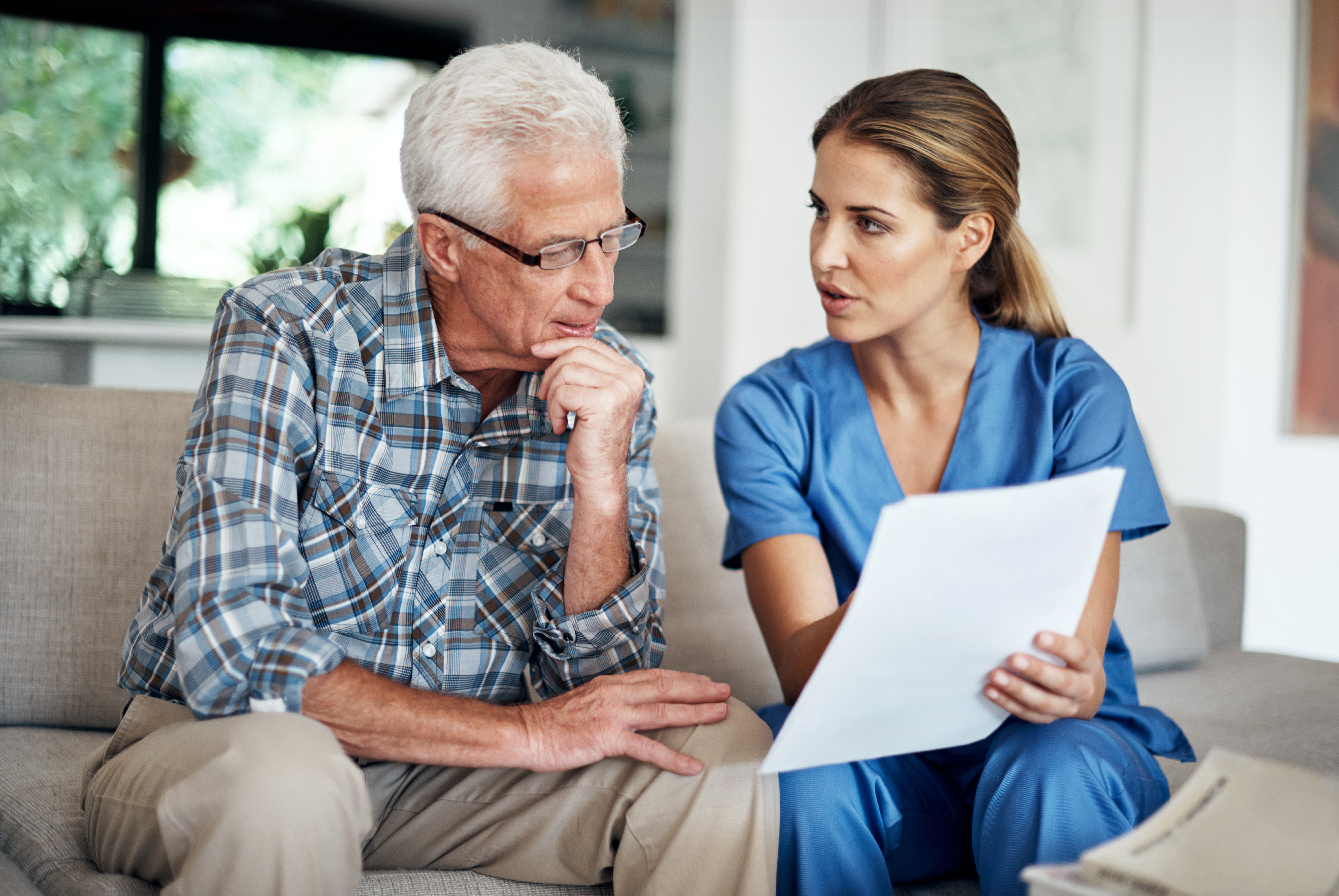 Physician speaking with patient