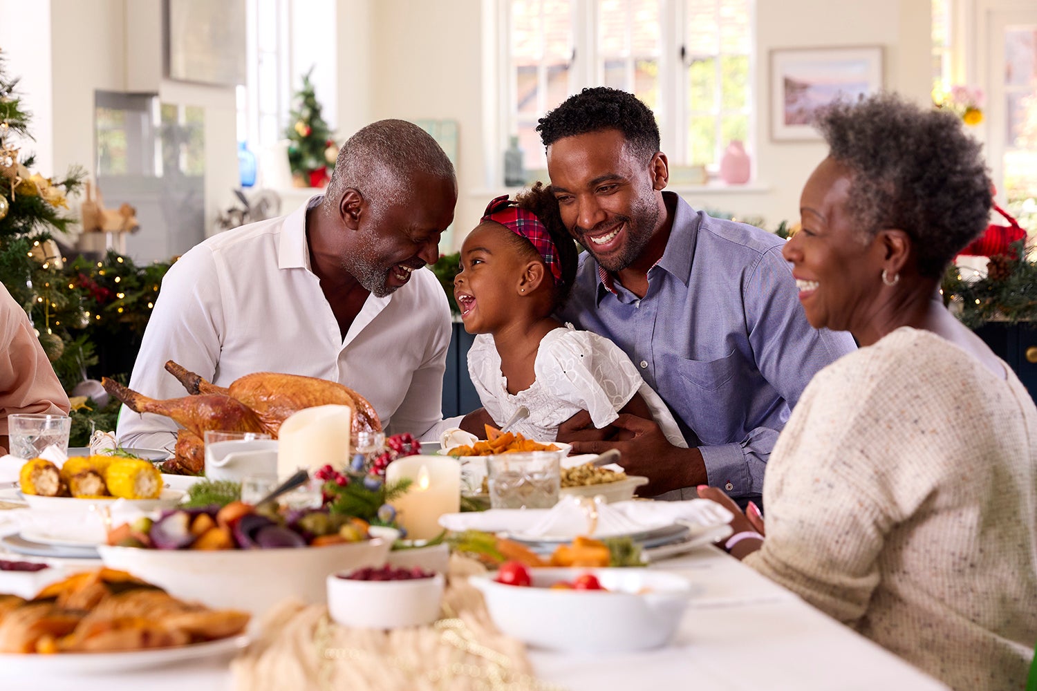 Family celebrating the holidays with a meal