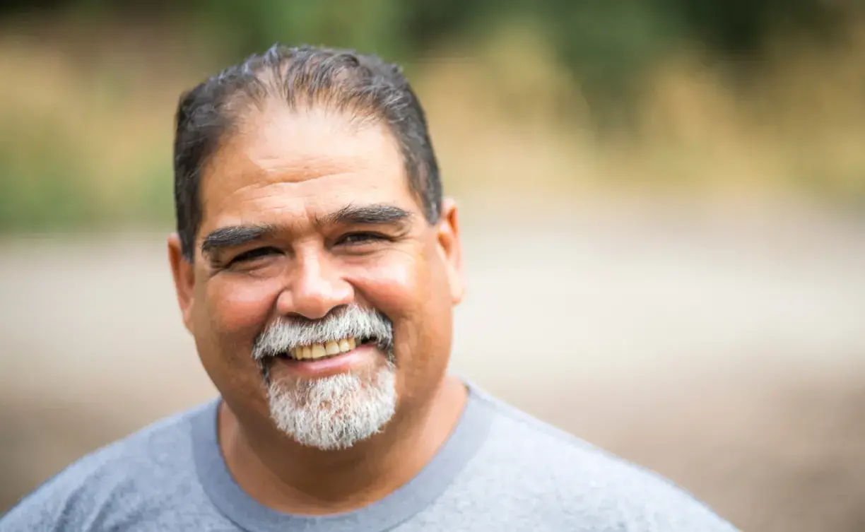 A smiling older man