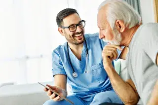 Doctor happily discussing cancer prevention