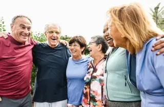 Group of seniors gathering around themselves to discuss health and hapiness