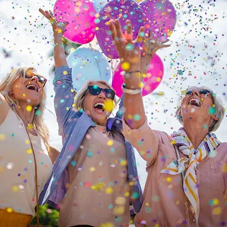 Seniors celebrating with balloons